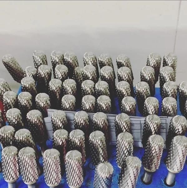 Full line of carbide burrs with machine ground cutting flutes